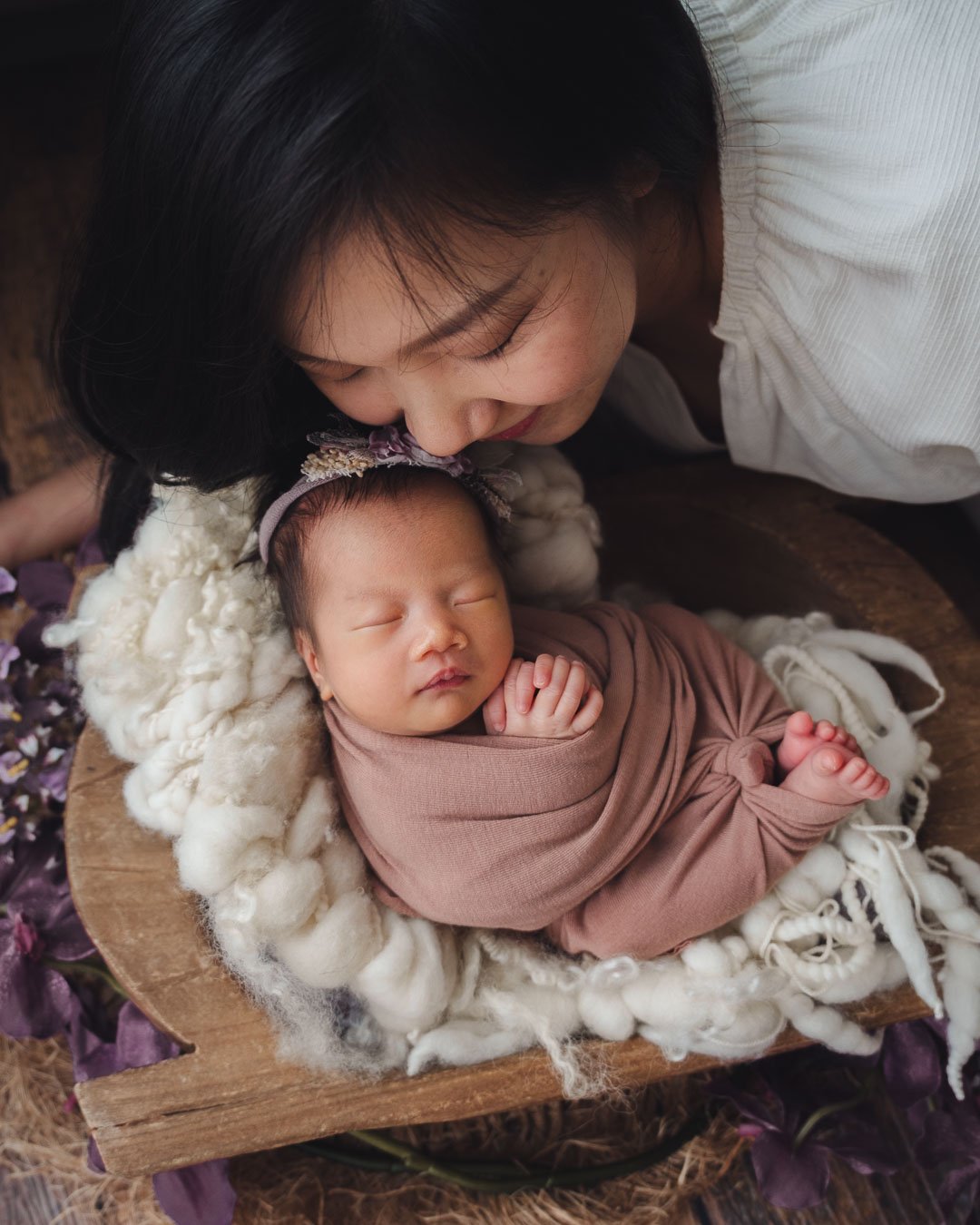 Intimate moment mom laying close to her baby girl